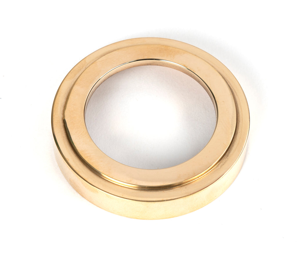 From The Anvil's Polished Brass Round Euro Escutcheon