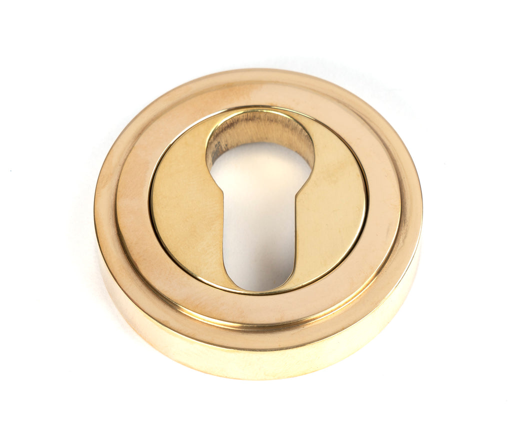 From The Anvil's Polished Brass Round Euro Escutcheon