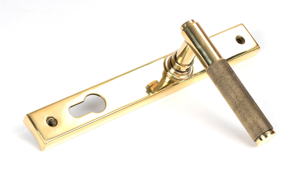 From The Anvil's Polished Brass Brompton Slimline Lever Espag. Lock Set