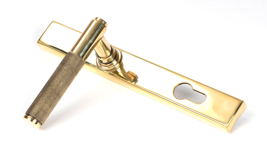 From The Anvil's Polished Brass Brompton Slimline Lever Espag. Lock Set