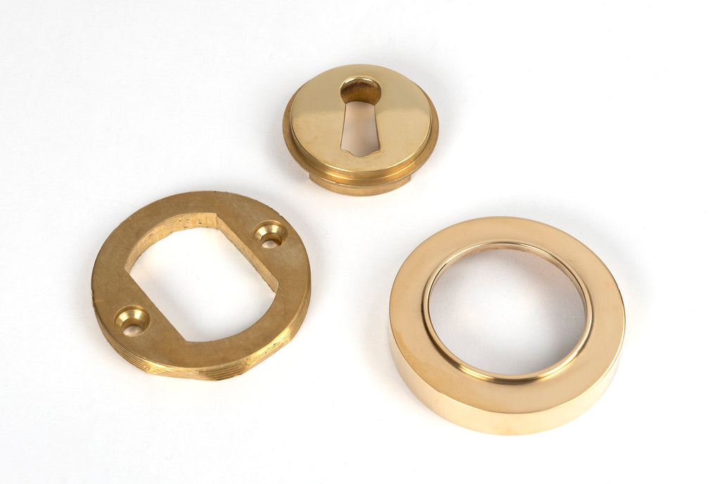 From The Anvil's Polished Brass Round Escutcheon