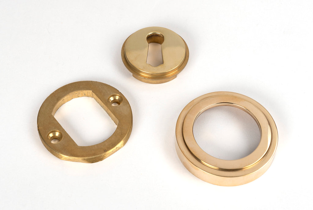 From The Anvil's Polished Brass Round Escutcheon