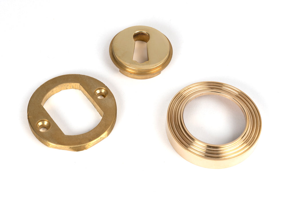 From The Anvil's Polished Brass Round Escutcheon