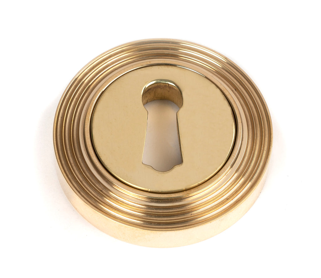 From The Anvil's Polished Brass Round Escutcheon