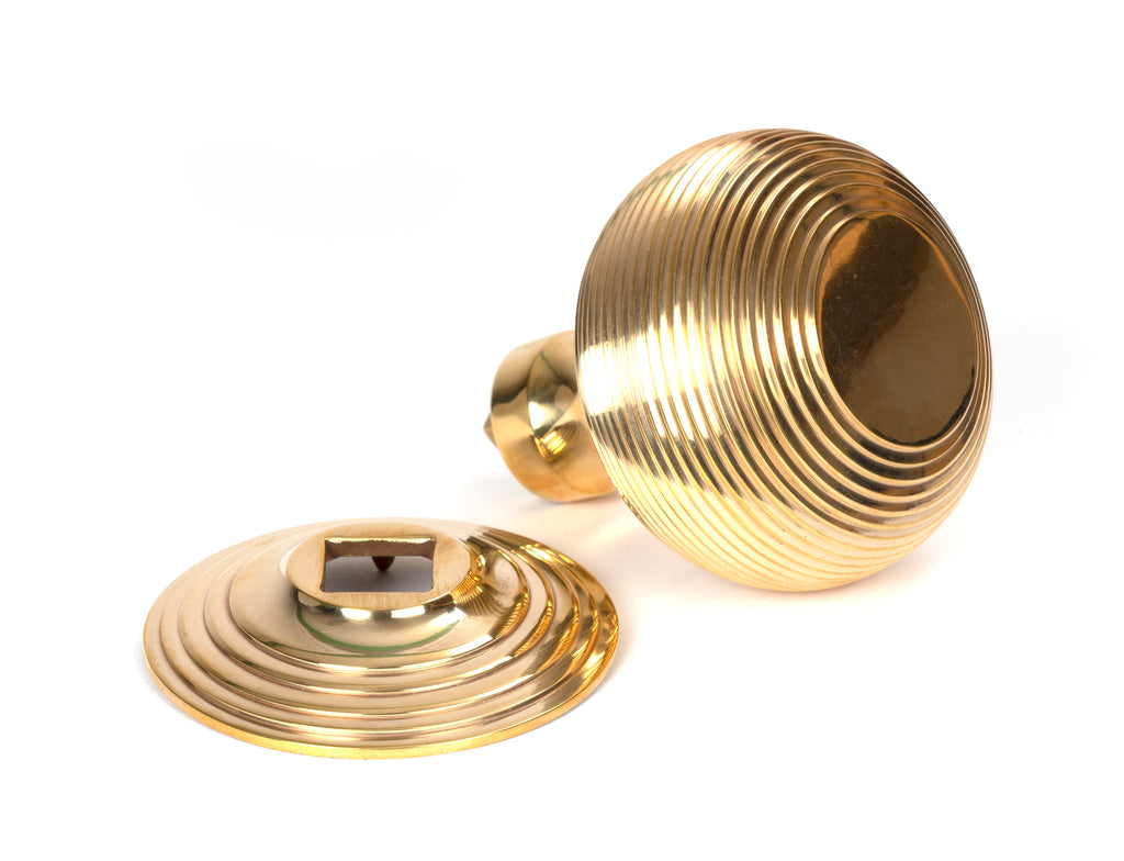 From The Anvil's Polished Brass Beehive Centre Door Knob