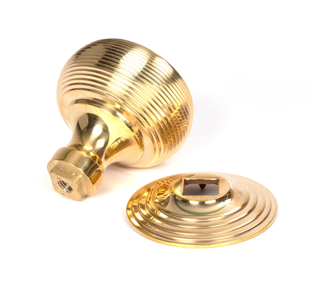 From The Anvil's Polished Brass Beehive Centre Door Knob