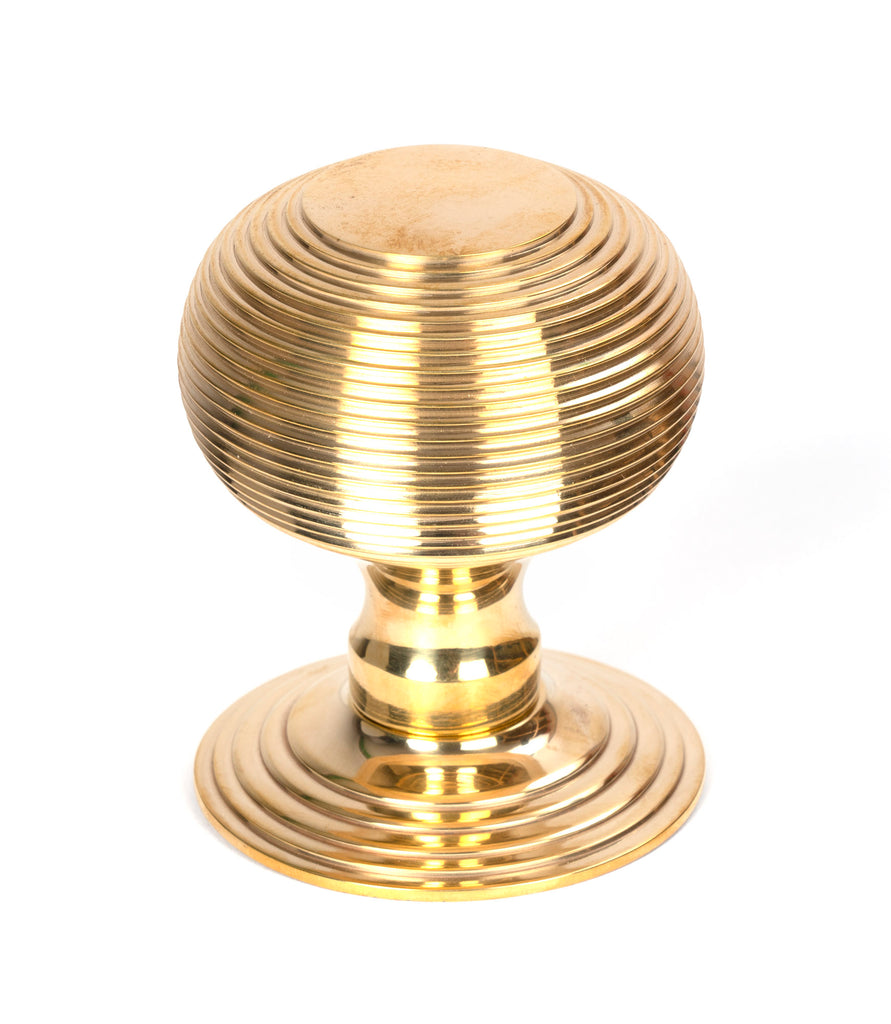 From The Anvil's Polished Brass Beehive Centre Door Knob