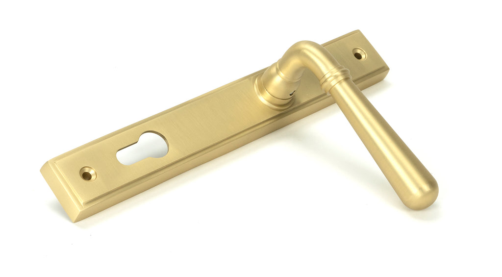 From The Anvil's Satin Brass Newbury Slimline Lever Espag. Lock Set