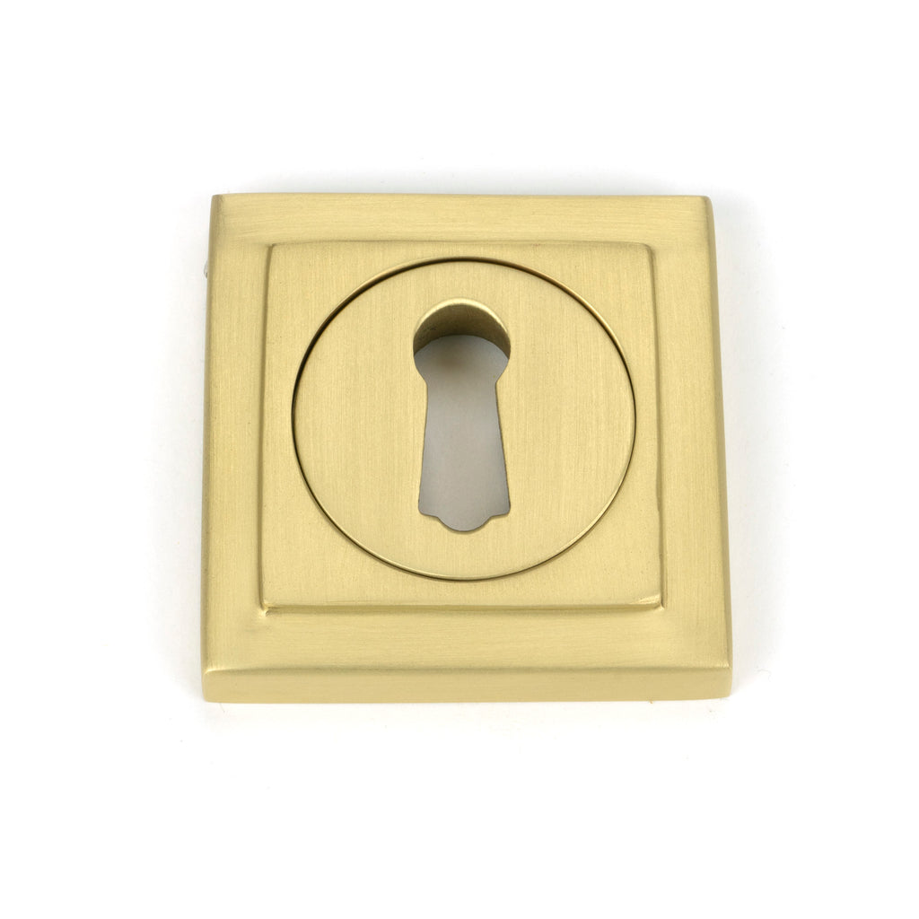 From The Anvil's Satin Brass Round Escutcheon