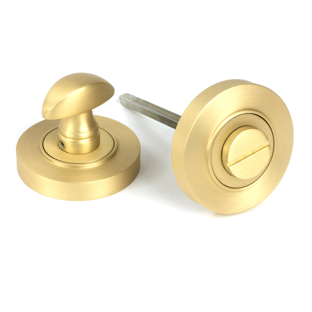 From The Anvil's Satin Brass Round Thumbturn Set