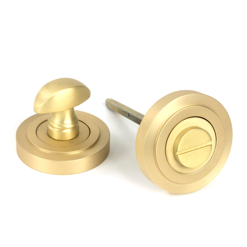 From The Anvil's Satin Brass Round Thumbturn Set