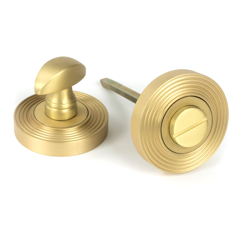 From The Anvil's Satin Brass Round Thumbturn Set