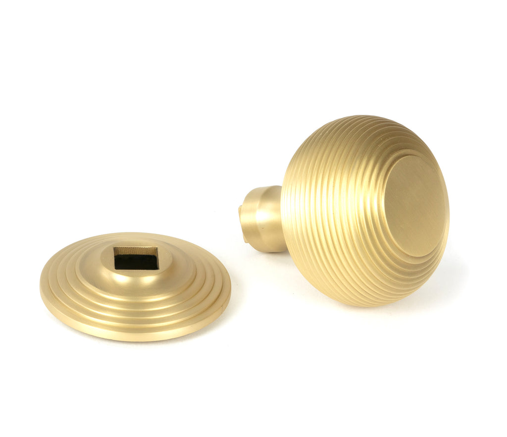 From The Anvil's Satin Brass Beehive Centre Door Knob