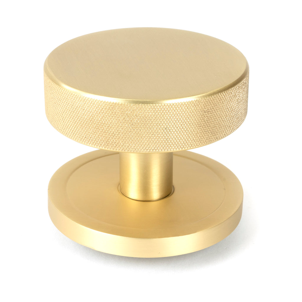 From The Anvil's Satin Brass Brompton Centre Door Knob