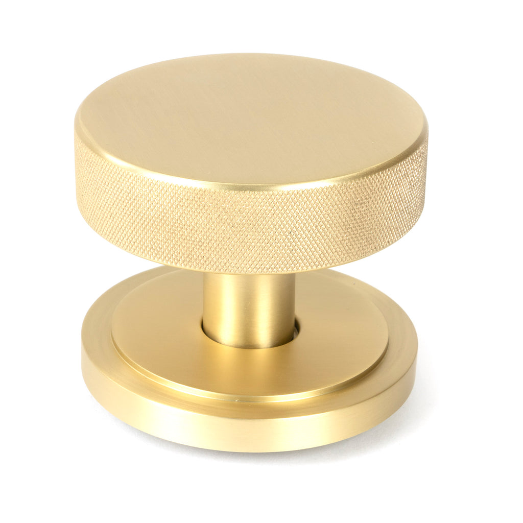 From The Anvil's Satin Brass Brompton Centre Door Knob