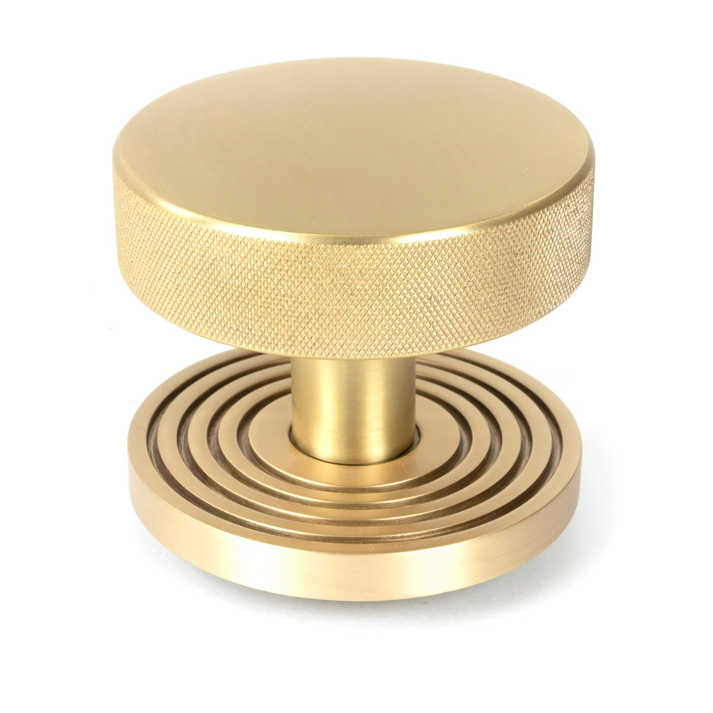 From The Anvil's Satin Brass Brompton Centre Door Knob