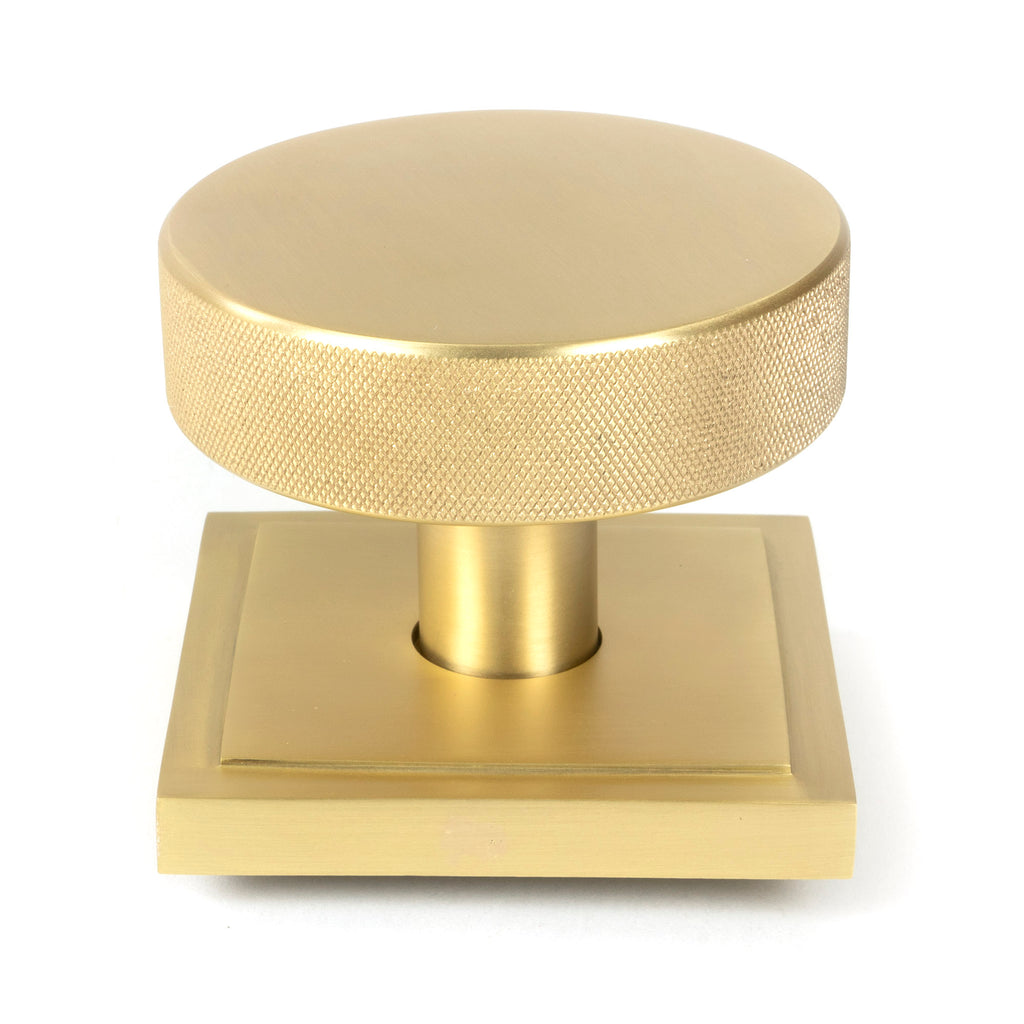 From The Anvil's Satin Brass Brompton Centre Door Knob