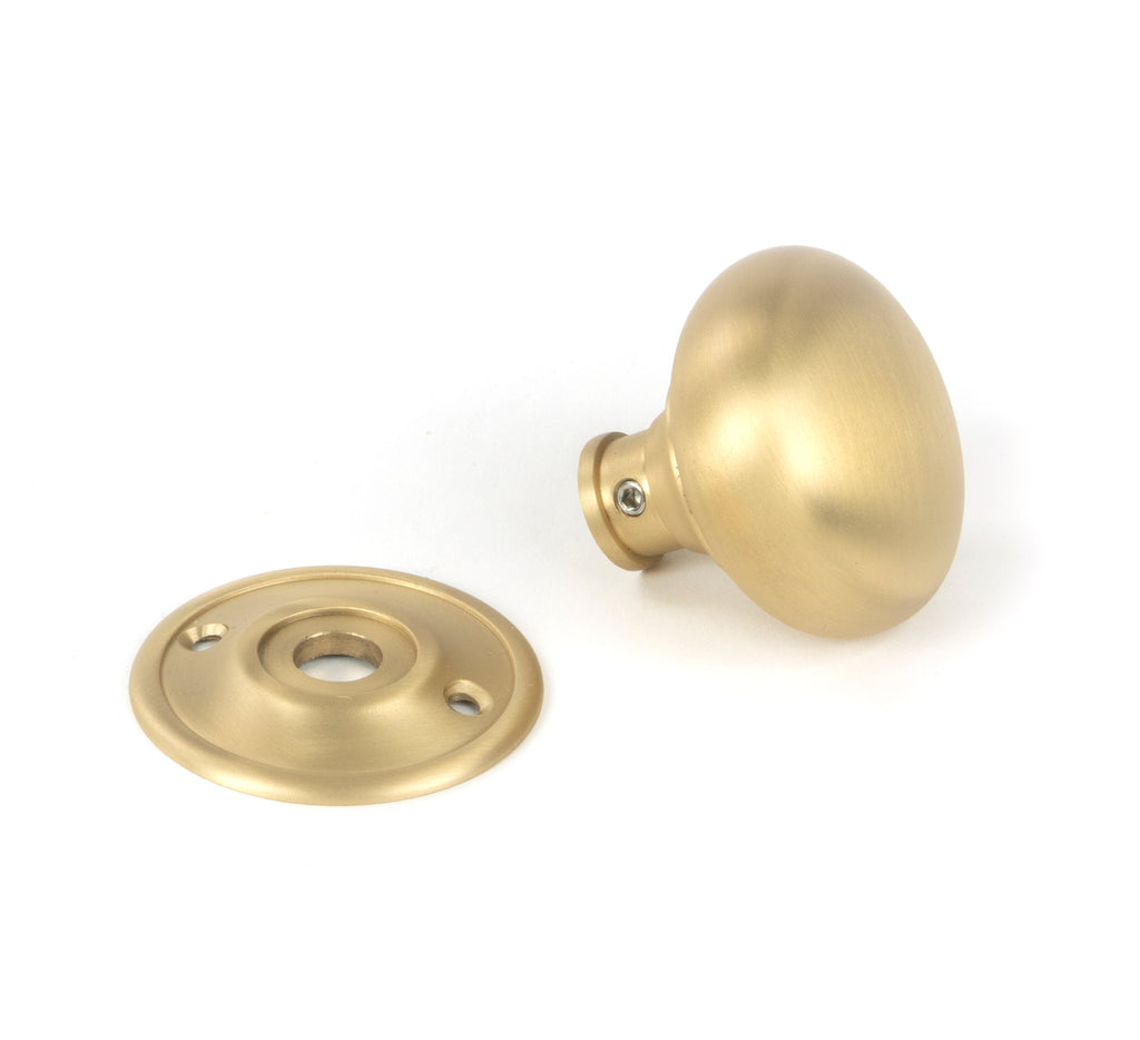 From The Anvil's Satin Brass Mushroom Mortice/Rim Knob Set