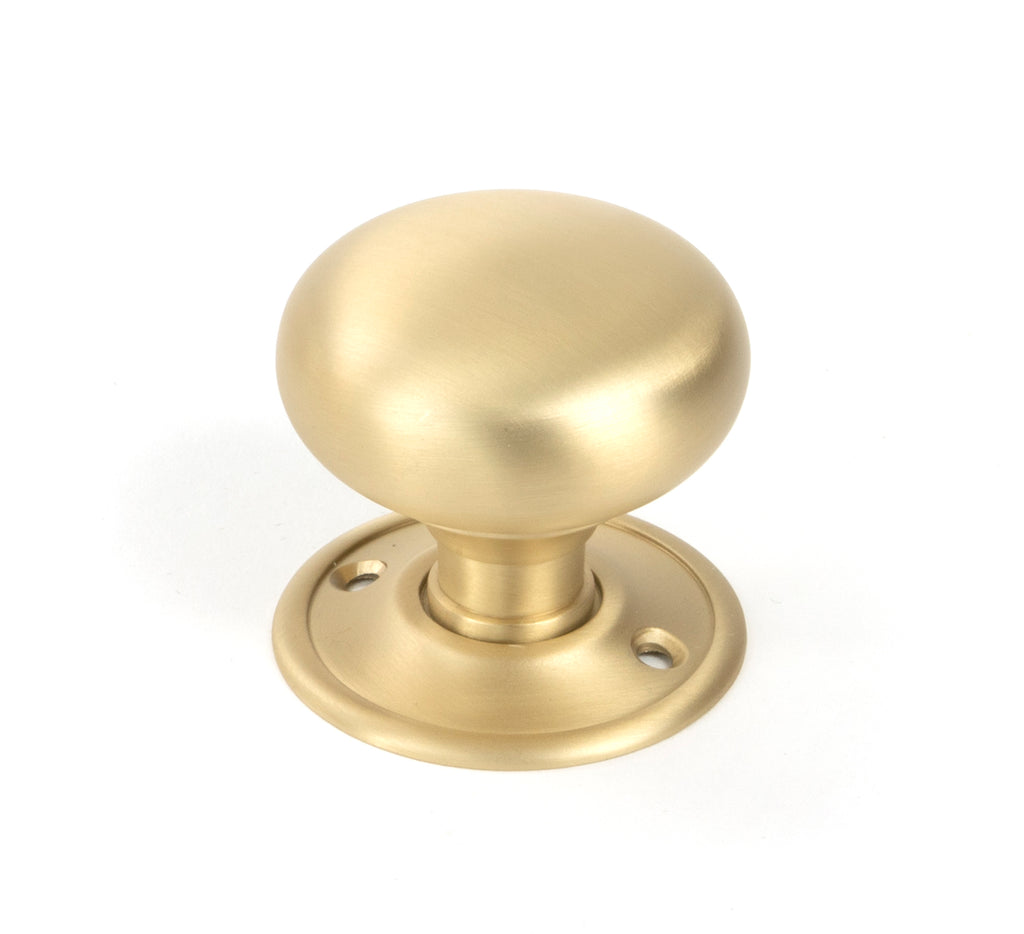 From The Anvil's Satin Brass Mushroom Mortice/Rim Knob Set