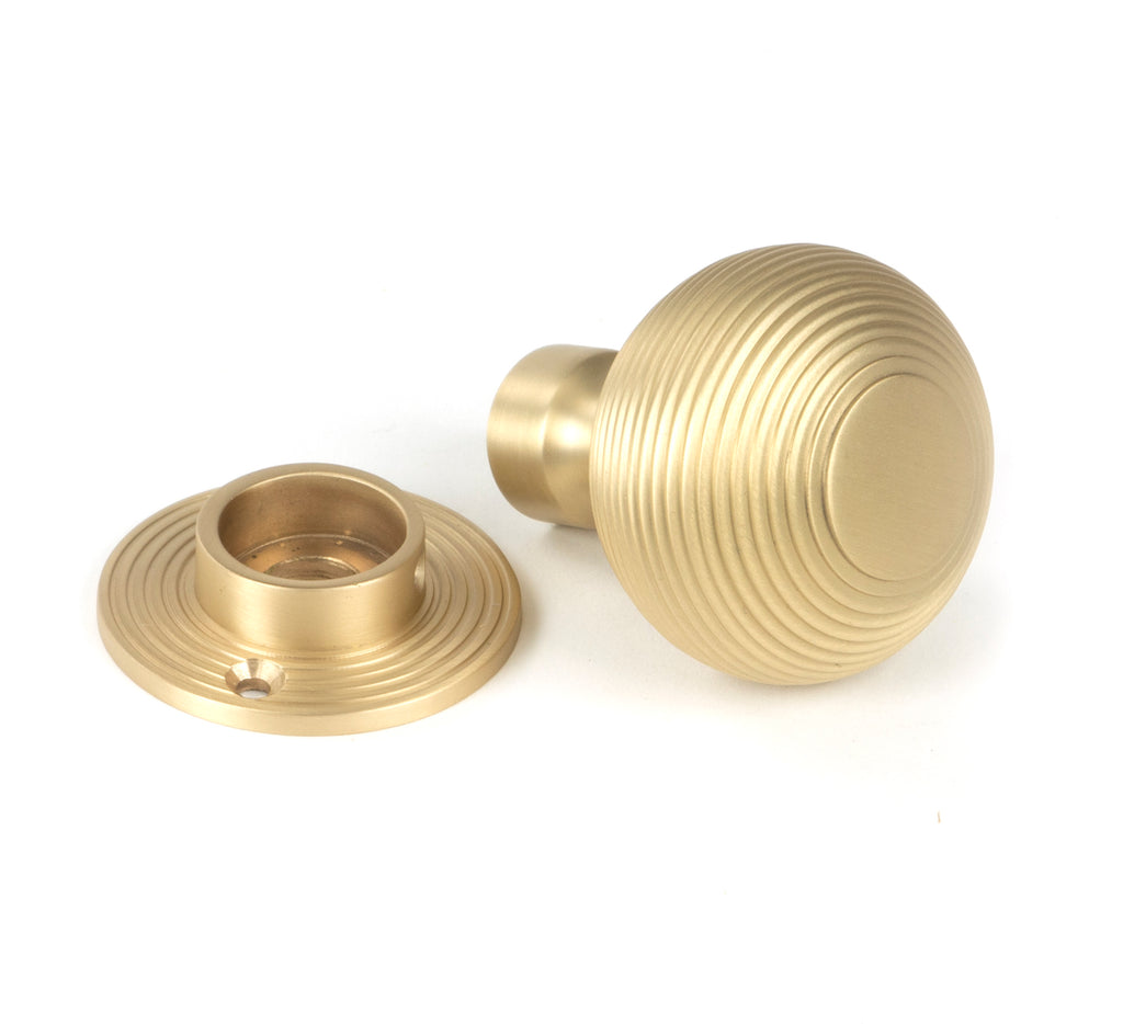 From The Anvil's Satin Brass Heavy Beehive Mortice/Rim Knob Set