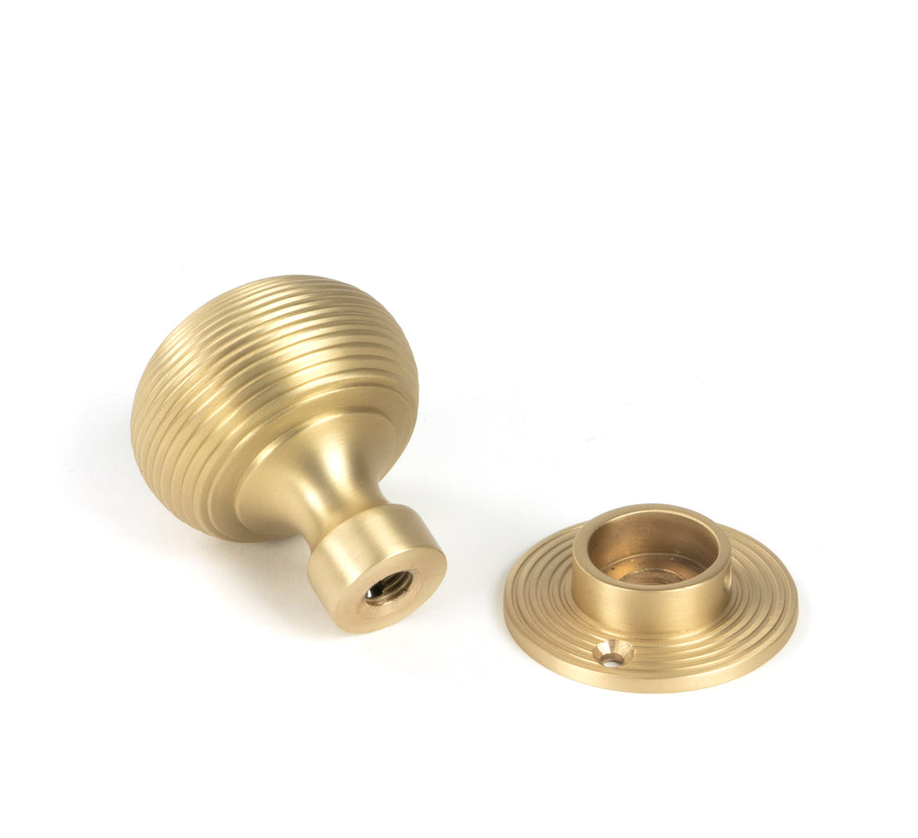 From The Anvil's Satin Brass Heavy Beehive Mortice/Rim Knob Set