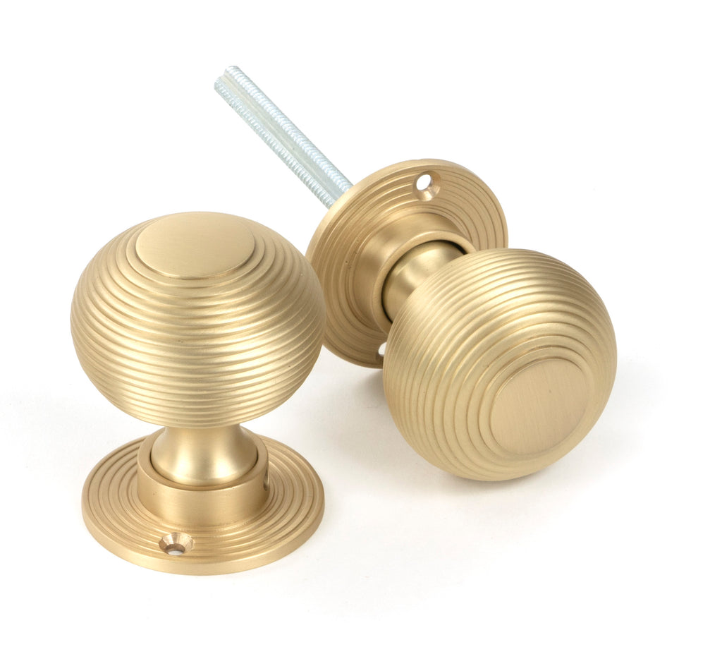 From The Anvil's Satin Brass Heavy Beehive Mortice/Rim Knob Set