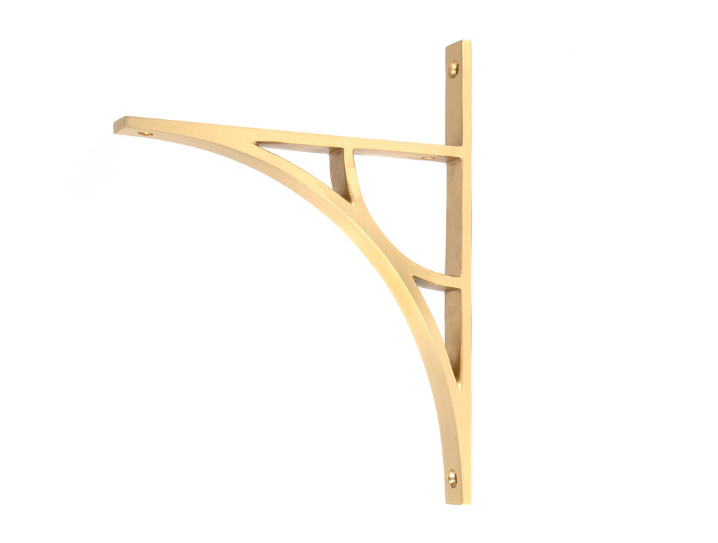 From The Anvil's Satin Brass Tyne Shelf Bracket