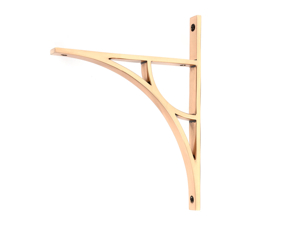 From The Anvil's Polished Bronze Tyne Shelf Bracket