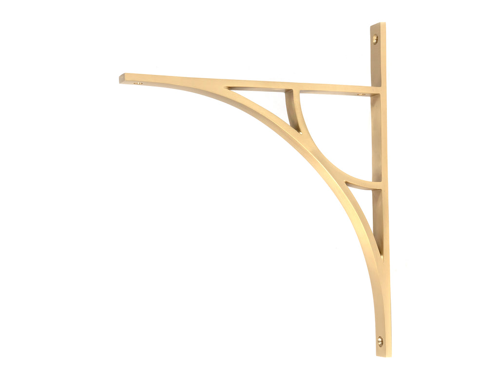 From The Anvil's Satin Brass Tyne Shelf Bracket