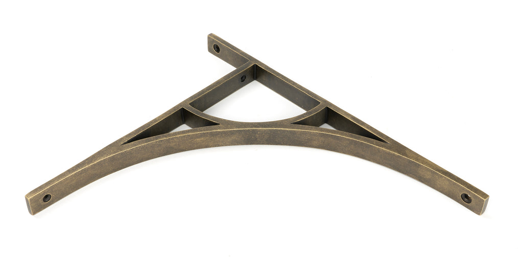 From The Anvil's Burnished Brass Tyne Shelf Bracket