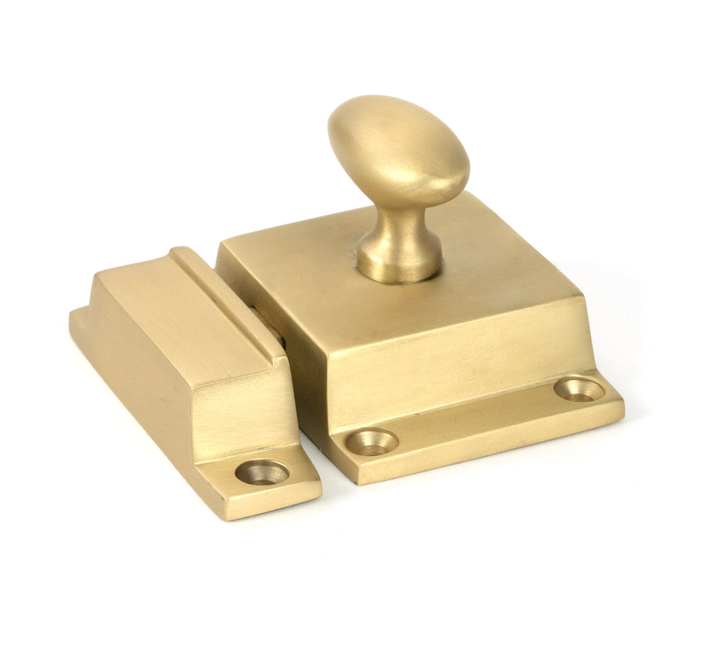 From The Anvil's Satin Brass Cabinet Latch