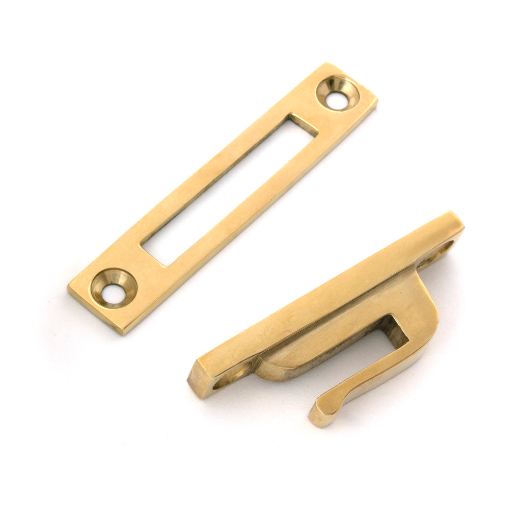 From The Anvil's Polished Brass Locking Brompton Fastener