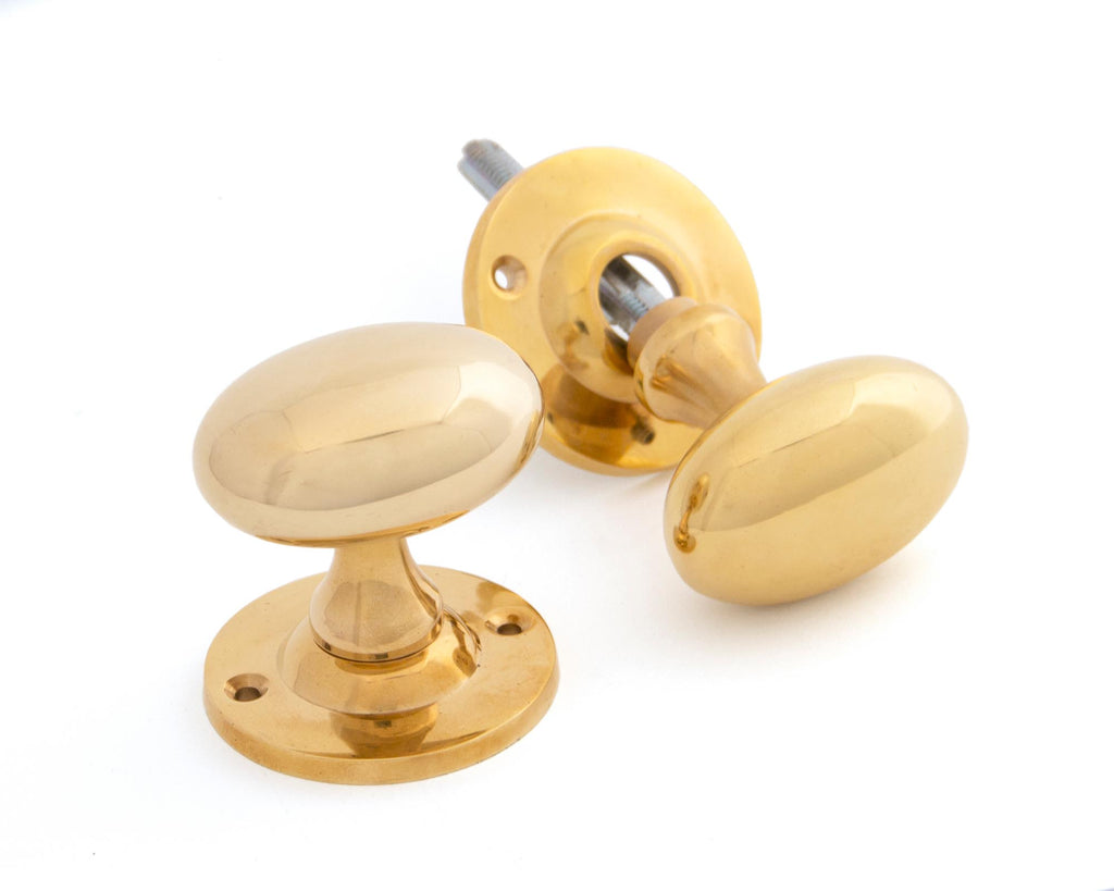 From The Anvil's Polished Brass Oval Mortice/Rim Knob Set