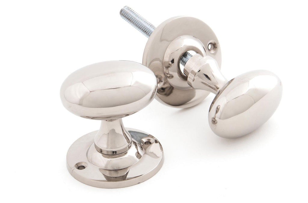 From The Anvil's Polished Nickel Oval Mortice/Rim Knob Set