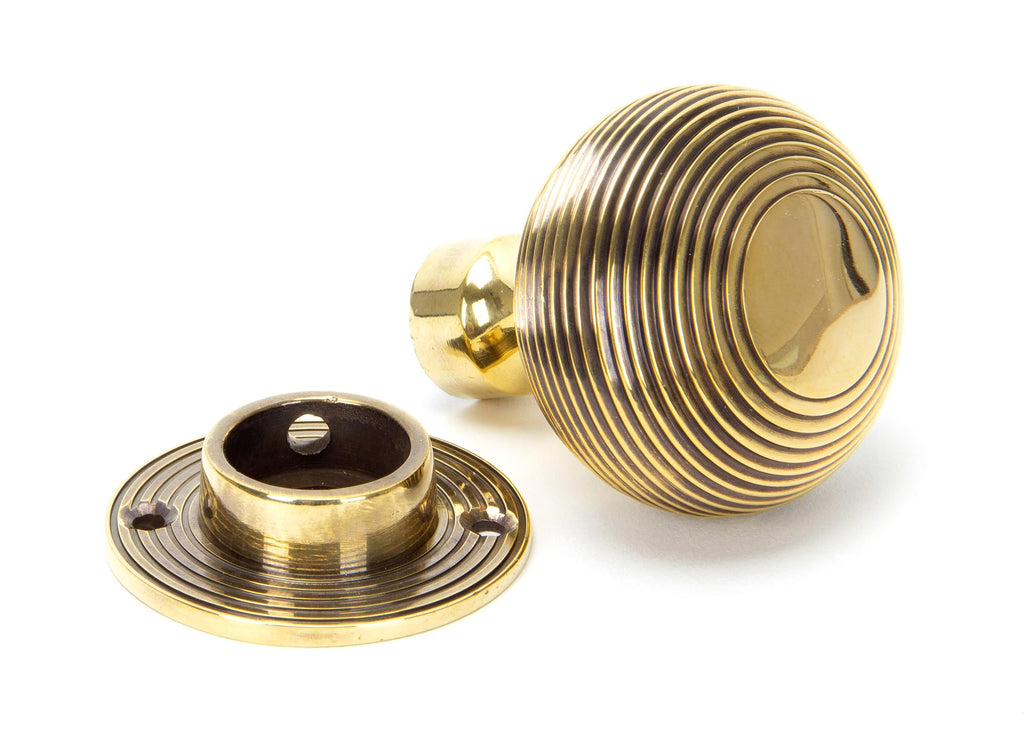 From The Anvil's Aged Brass Heavy Beehive Mortice/Rim Knob Set