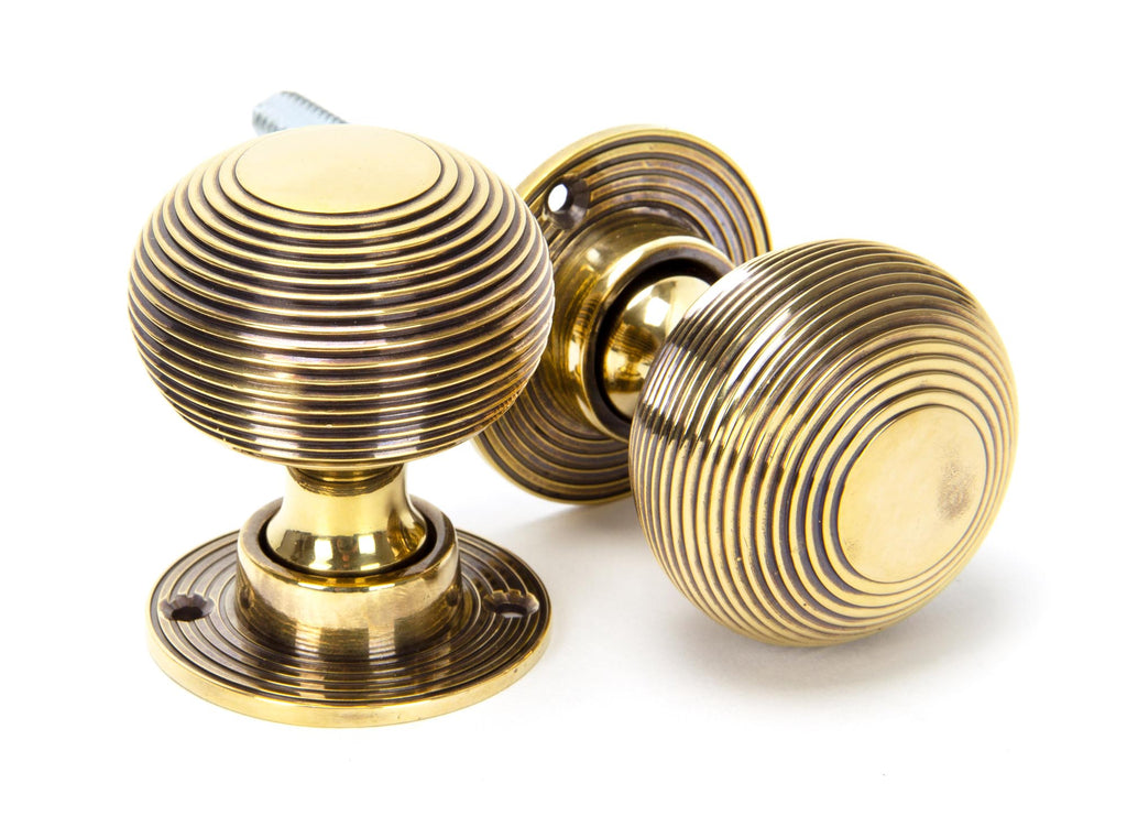 From The Anvil's Aged Brass Heavy Beehive Mortice/Rim Knob Set