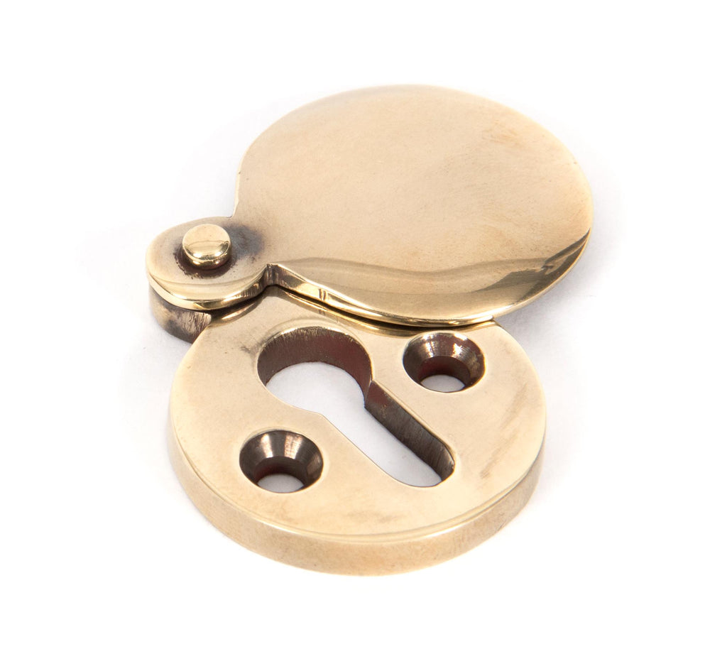 From The Anvil's Aged Brass 30mm Round Escutcheon