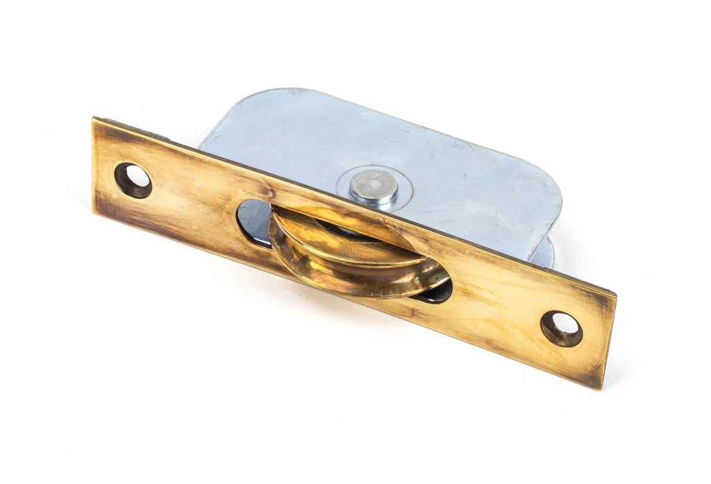 From The Anvil's Aged Brass Square Ended Sash Pulley 75kg