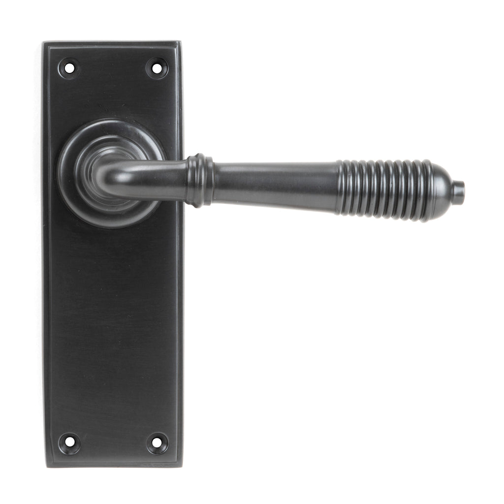 From The Anvil's Aged Bronze Reeded Lever Latch Set