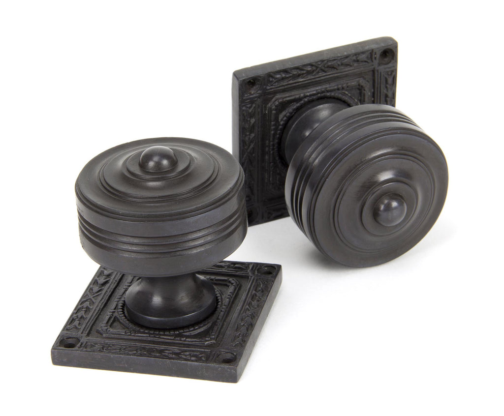 From The Anvil's Aged Bronze Tewkesbury Square Mortice Knob Set