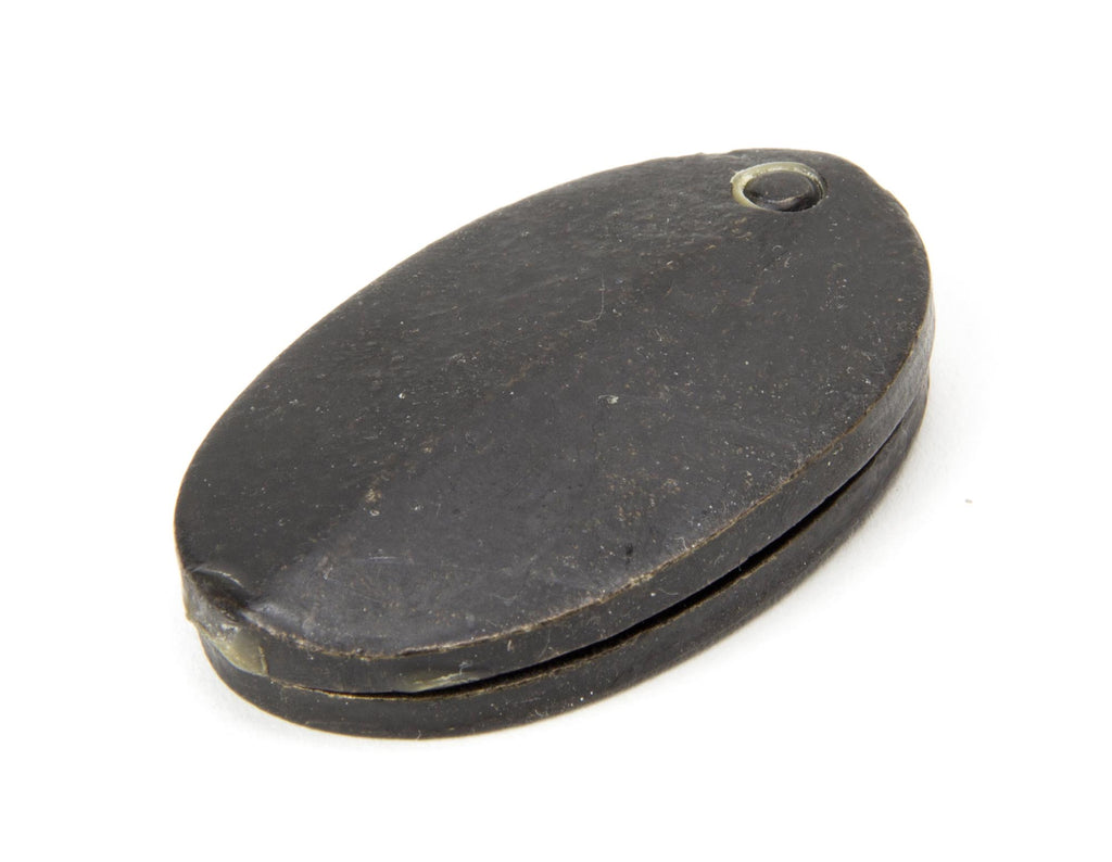 From The Anvil's External Beeswax Oval Escutcheon