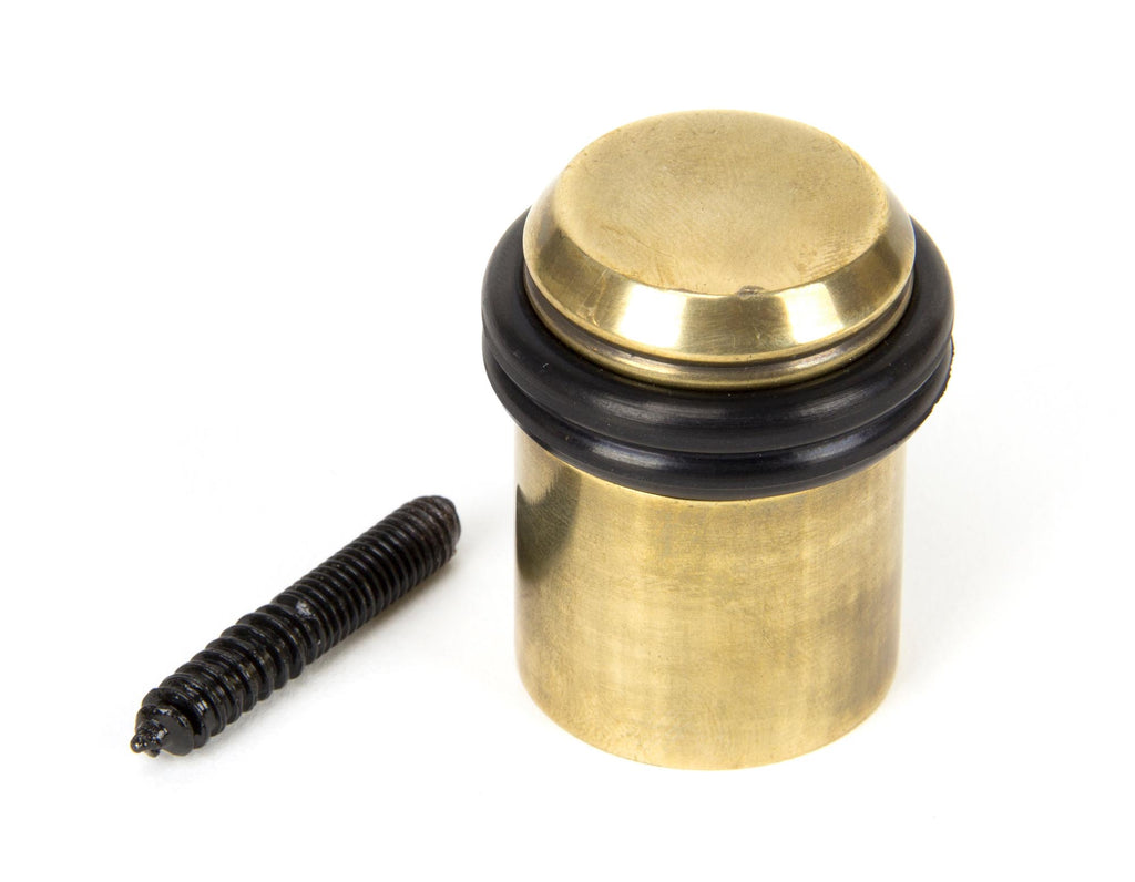 From The Anvil's Aged Brass Floor Mounted Door Stop