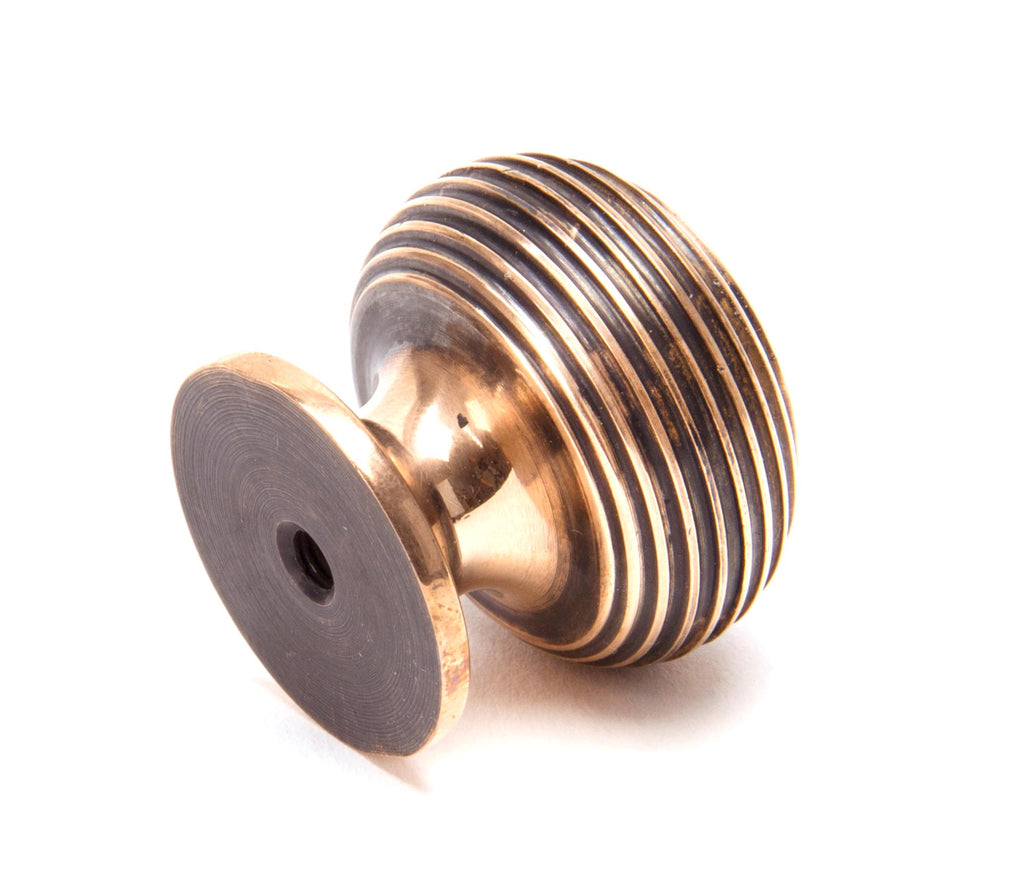 From The Anvil's Polished Bronze Beehive Cabinet Knob