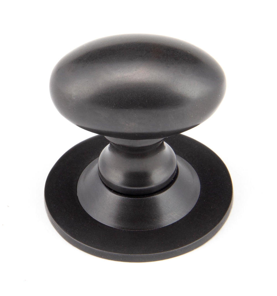 From The Anvil's Aged Bronze Oval Cabinet Knob